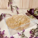 Transparent acrylic open corner tray for hampers.