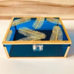 Feather Print Box displayed with other decorative storage boxes for comparison.