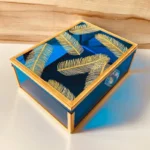 Top view of Feather Print Box highlighting golden feather design on lid.