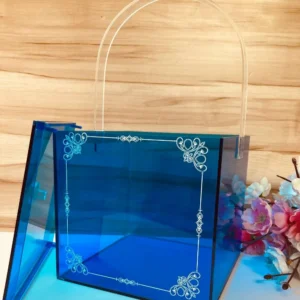 Blue acrylic printed box with clear handle, front view.