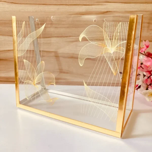 Side view of Printed Cross Bag showing gold metallic frame edges.
