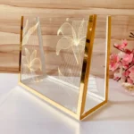 Side view of Printed Cross Bag showing gold metallic frame edges.