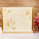 Golden Cross Bag displayed as a décor piece on tabletop.