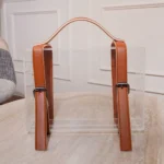 Empty suitcase box with lid open showing storage space inside.