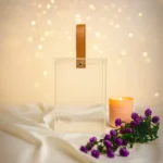 Solid transparent acrylic box with premium stitched leather handle.