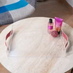 Acrylic tray styled with decorative spa products and accessories.