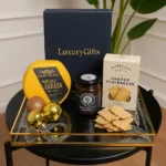 Gold Aurora Luxe Tray on black round table with golden decorative balls