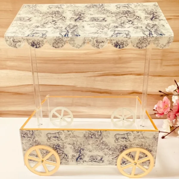 Dior cart hamper with vintage printed canopy.