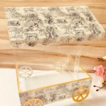 Side angle of Dior cart with printed design.