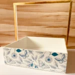 Gold handle tray with butterfly print design.