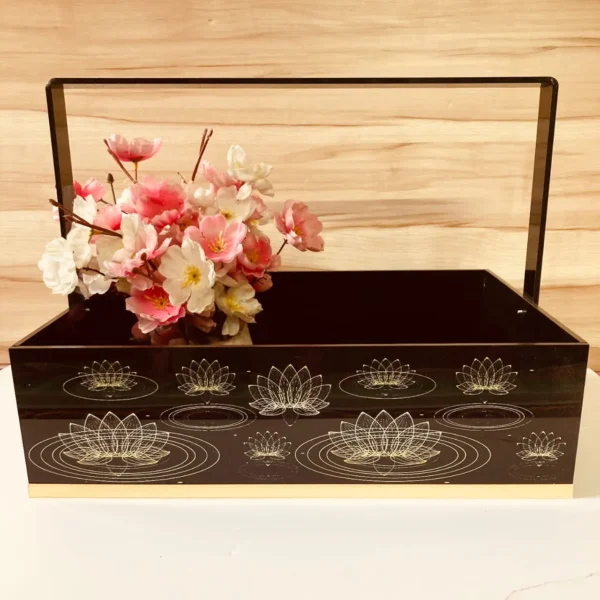 Premium hamper basket with handle and lotus design.