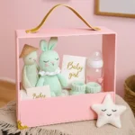 Luxury acrylic gift carrier styled with minimalistic decor items inside.