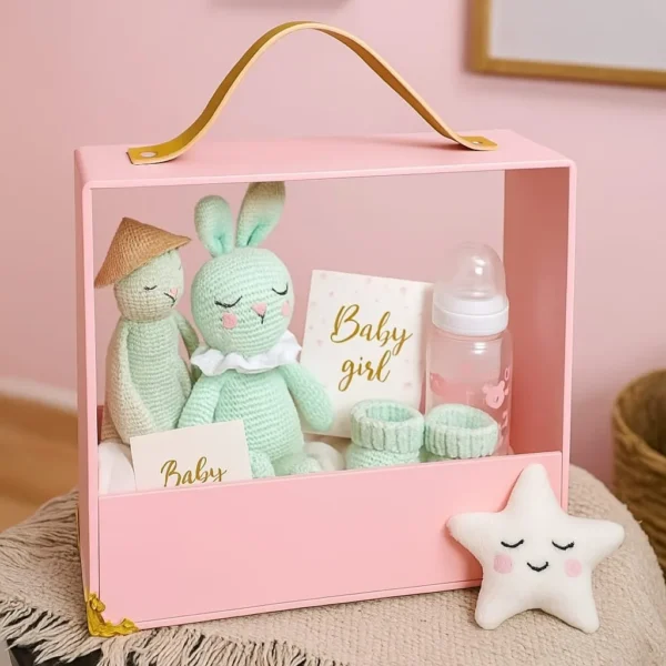 Luxury acrylic gift carrier styled with minimalistic decor items inside.
